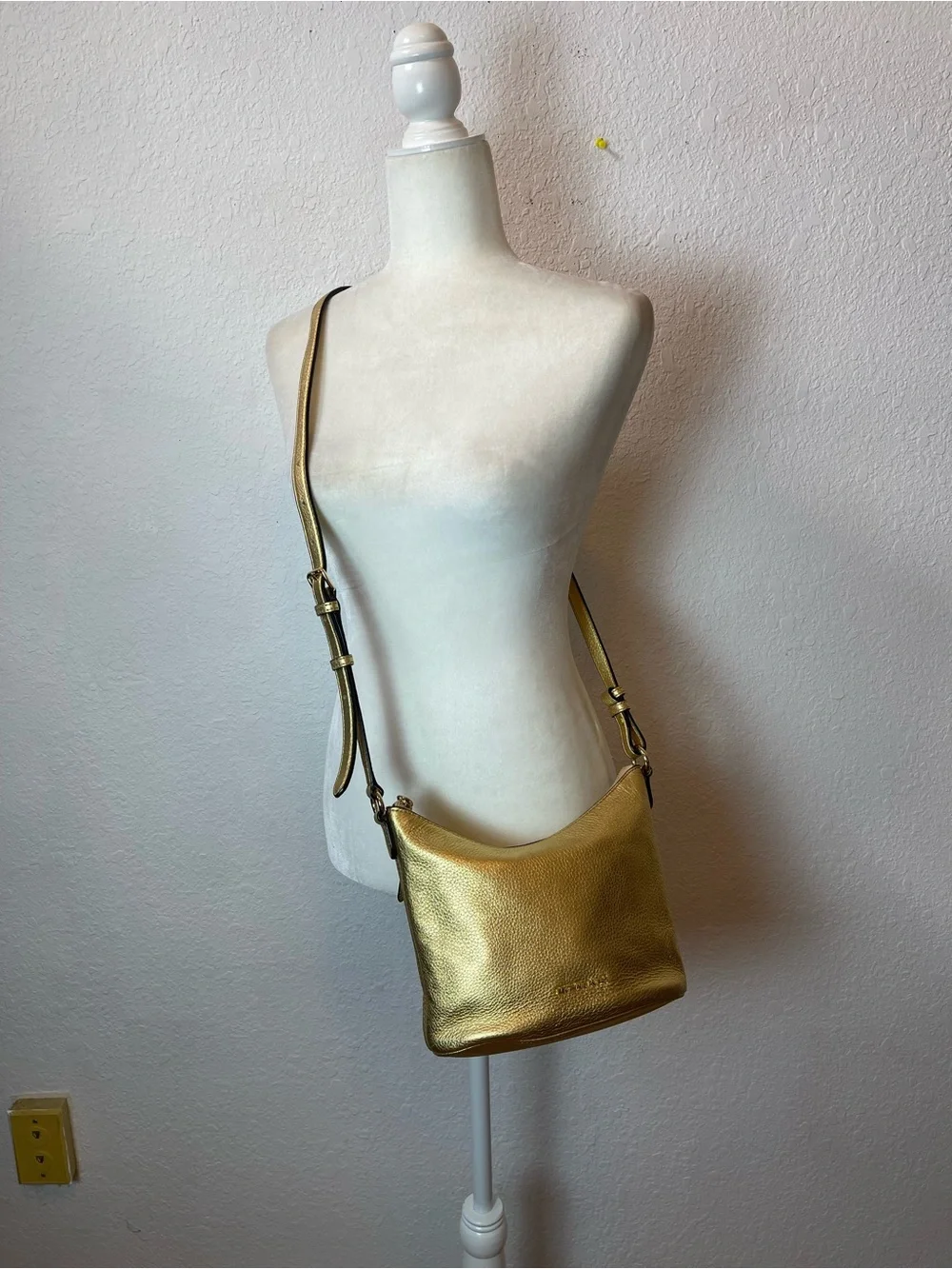 Michael Kors Gold leather hobo crossbody bag.